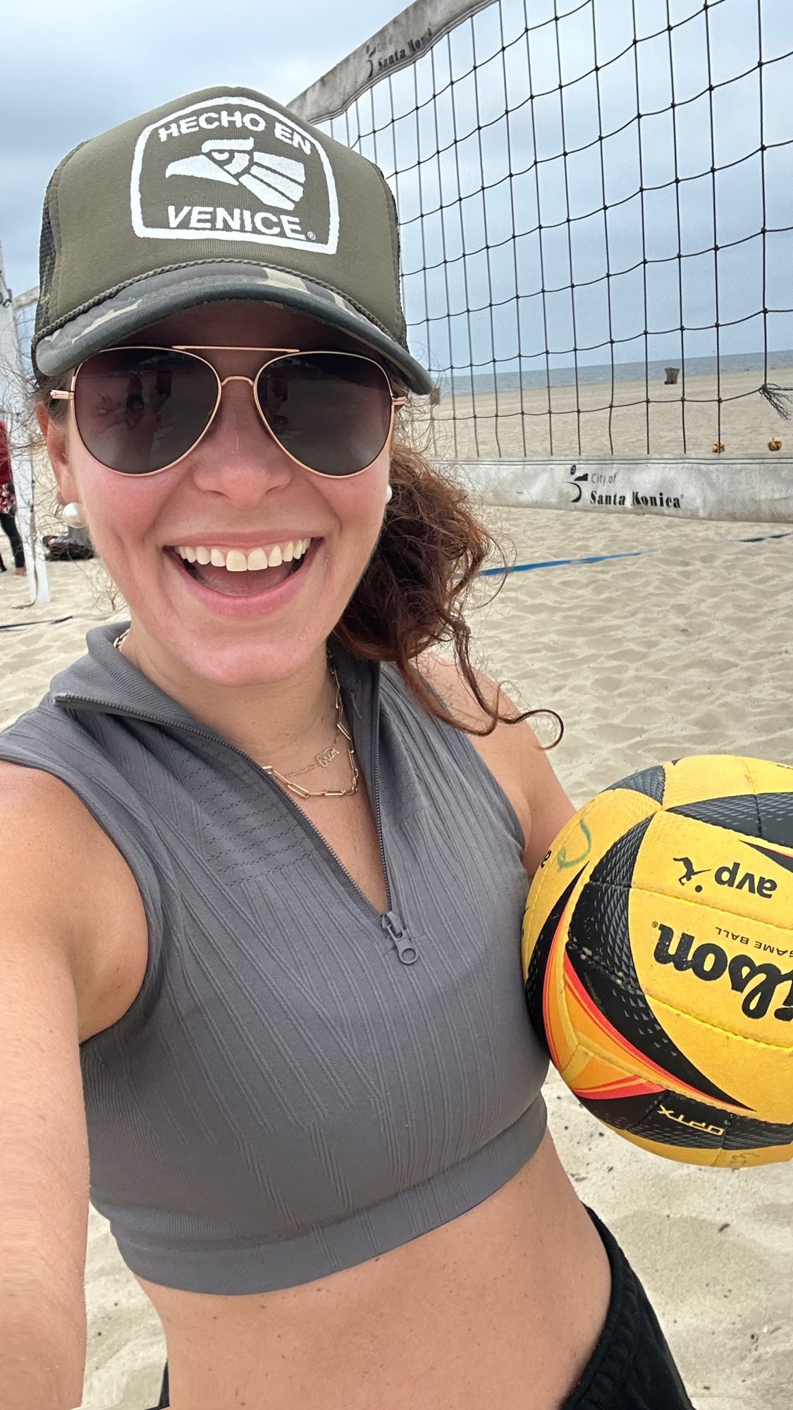 Erin on the sand with a volleyball